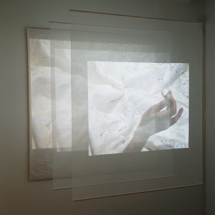 Timeless in time, 2009, H127 x W127 x D50 cm, wall hanging, 2 panels, video projection, music, collection Textilsammlung Max Berk, Heidelberg, D